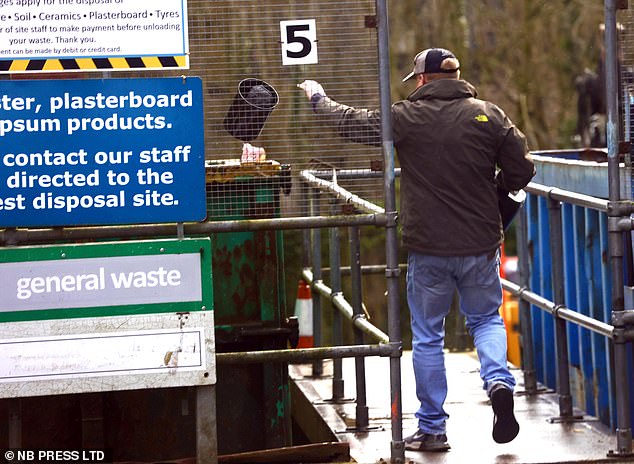 As well as disposing of belongings at the rubbish tip (pictured), Bush has also been spotted walking his two dogs ahead of his sentencing in four months' time