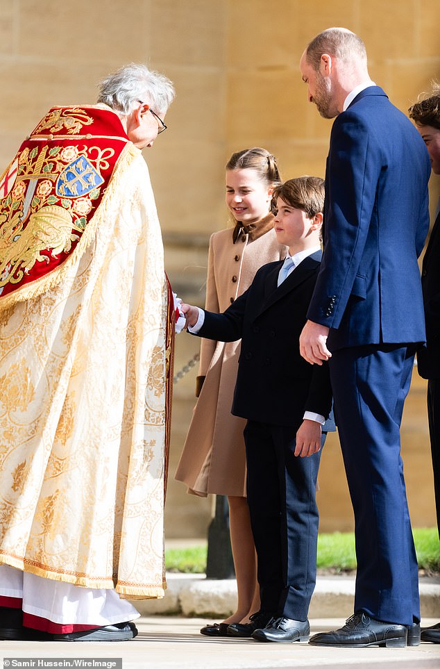 Princess Charlotte of Wales and Prince William, Prince of Wales, stand next to Prince Louis of Wales as he shakes hands with the Dean of Windsor, the Rt. Rev. Christopher Cocksworth -- April 5, 2026