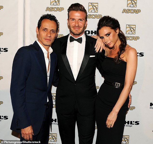 Marc pictured with David and Victoria in 2012