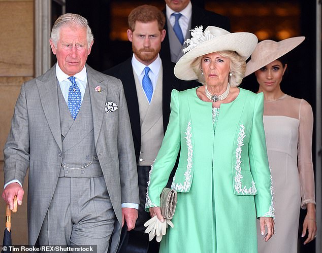 Pictured: Prince Harry, King Charles, Queen Camilla and Meghan, Duchess of Sussex at Charles' 70th Birthday Patronage Celebration at Buckingham Palace in London in 2018