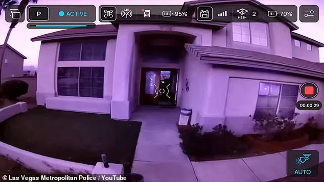 Authorities swarmed the Las Vegas home on January 31 and arrested a man named Ori Solomon, an Israeli citizen who police said managed the property. A still photo from the raid is pictured