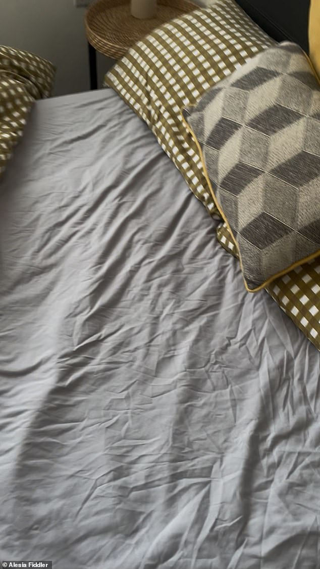 We pull back the duvet to find crumpled bedsheets that don't seem clean and fresh