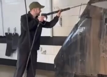 Moment Ukrainians in car wash hose down a Russian-Iranian kamikaze drone 'before it's fired straight back at Putin'