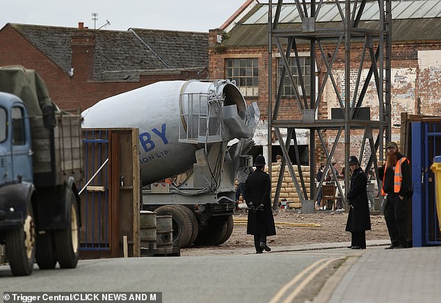 The Sheby family name was also written on the side of a cement mixer