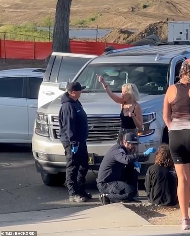 The Riverside County Sheriff's Office made no arrests and the collision remains under investigation, but the white sedan - which allegedly sped through a red light - sustained far more damage to its front end than Spelling's car did on the back end