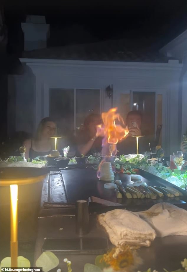 On Saturday night, Silvana posted an Instagram story of the group enjoying a teppanyaki meal outside, including Spelling's 17-year-old daughter Stella (L)