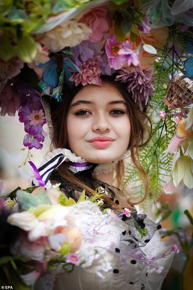 Gordon Donovan, a photographer, said: 'The colors were everywhere for all to see. Church bells were ringing, and creativity was in full bloom around St Patrick's Cathedral during its Easter Masses'