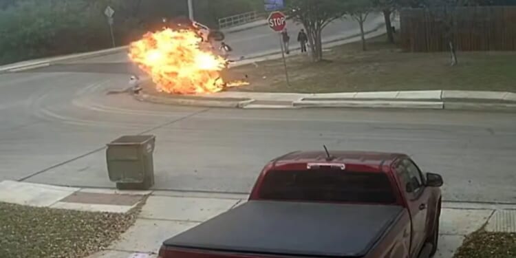 Motorbike erupts into fireball after skidding off road and exploding