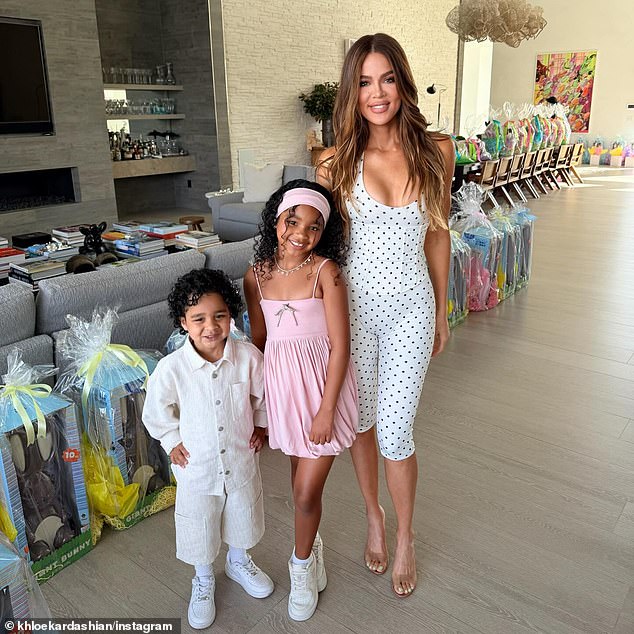 Khloé, 41, also posted multiple photos of her posing alongside her daughter True, seven, and son Tatum, three, as they posed in front of the supersized Easter gift baskets in the background