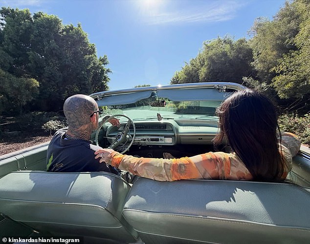 Kim snapped a photo of her arriving in Travis and Kourtney's convertible