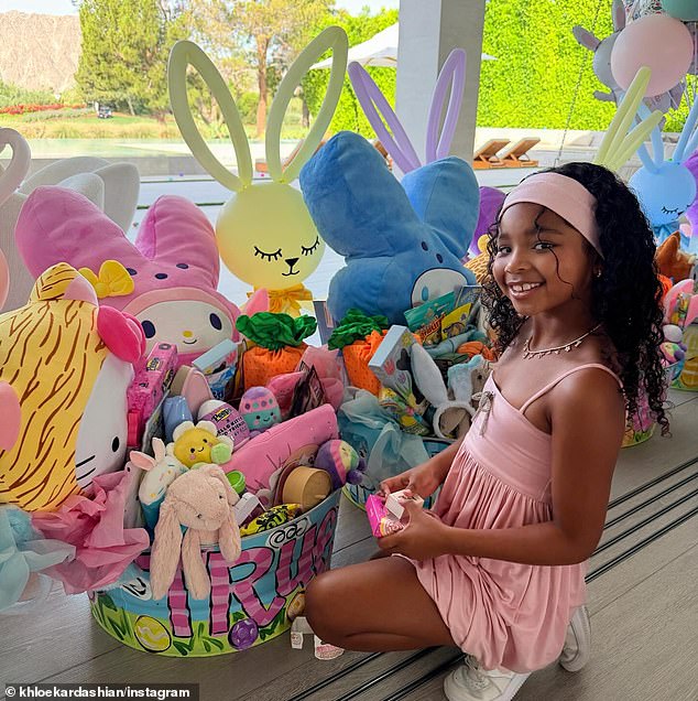 For the Easter celebration, each family member received a supersized gift basket, as seen in a photo Khloé snapped of her daughter True posing by hers