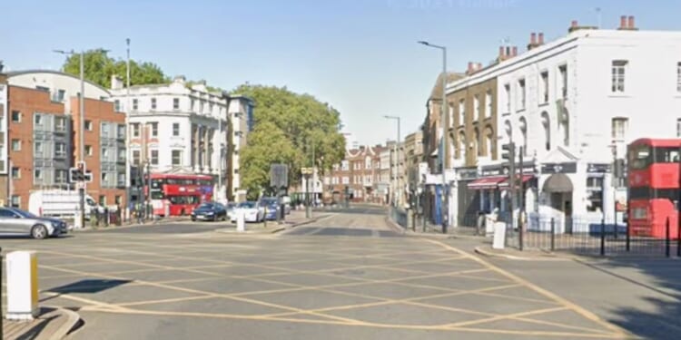 Woman in her 30s dies in two-car crash in East London as two men under arrest in hospital