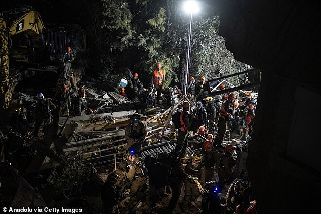 Search and rescue teams are continuing search and rescue operations as numerous security forces, civil defense, and fire crews are continuing their work at the scene following Iran's retaliatory strike targeting northern Israel, in which a missile directly hit a building in Haifa, Israel on April 05, 2026