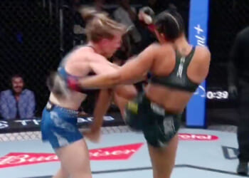 Glamorous UFC star knocked out with sickening knee to the head as quick-thinking referee dives in to save her