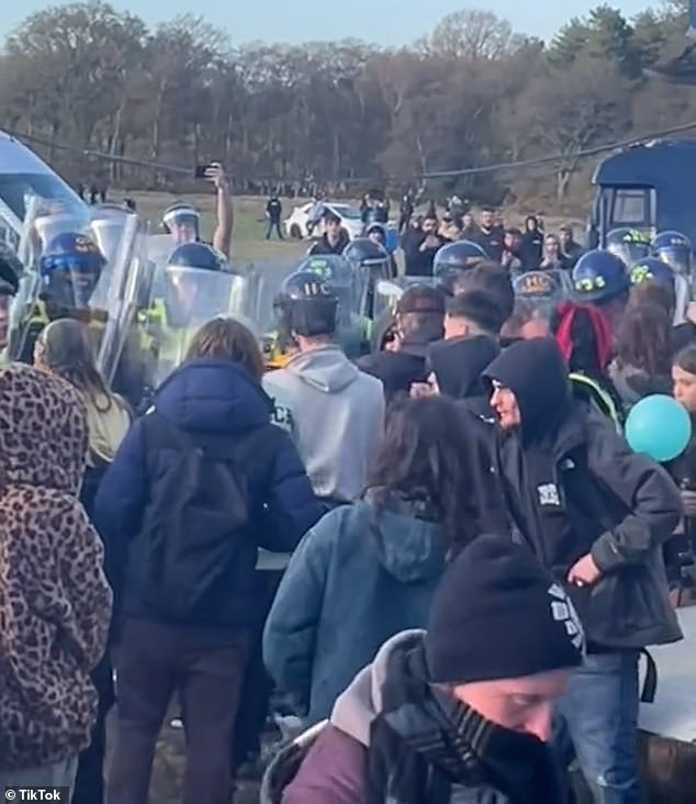 Officers in riot gear had missiles thrown at them by the 'violent and hostile' crowd as they tried to put a stop to the event and its huge sound systems