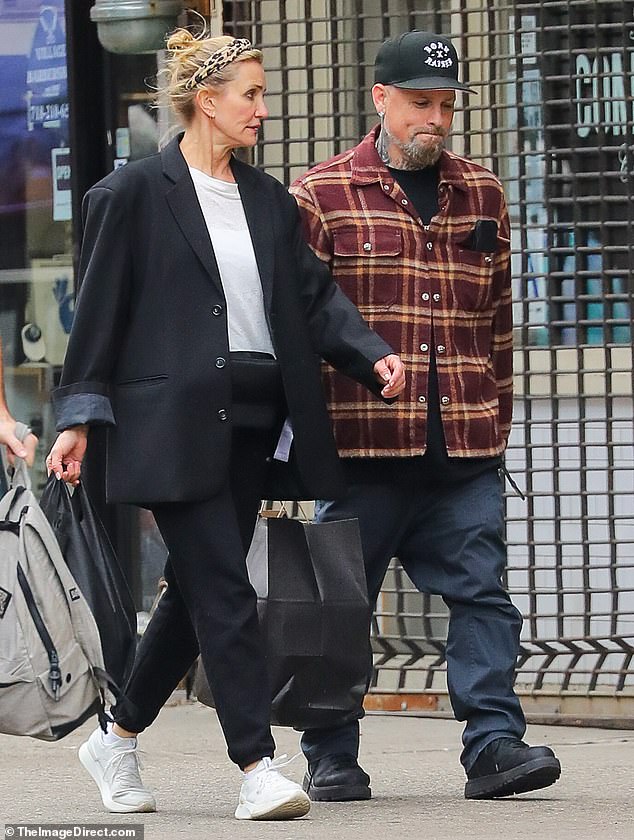 The actress, 53, and the Good Charlotte rocker, 47, opted for low-key looks as they stepped out in New York on Saturday – marking their first public outing as a couple in four months
