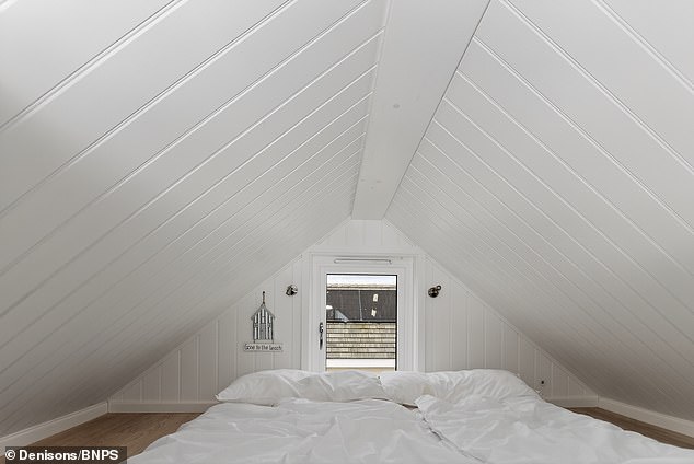 The mezzanine can be accessed by a loft hatch and ladder, with a lounge area doubling as a bedroom and advertised space for a further four people to sleep