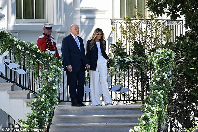 Trump and First Lady Melania Trump walks down the steps as they host the annual Easter Egg Roll