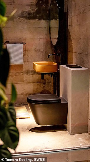 She says the shower is 'cool and has a glass floor'. 'There was a hole in the floor and instead of filling it in we said "let's put glass in it",' she added