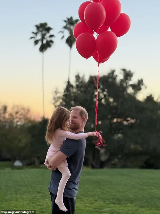 On February 14, Meghan posted another picture of Lilibet, this time cuddling Prince Harry. Lilibet’s face – for once – was clearly visible, albeit in profile