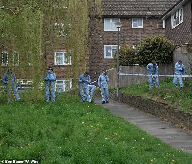 Forensic officers near to the scene in Woolwich where Eghosa was fatally shot