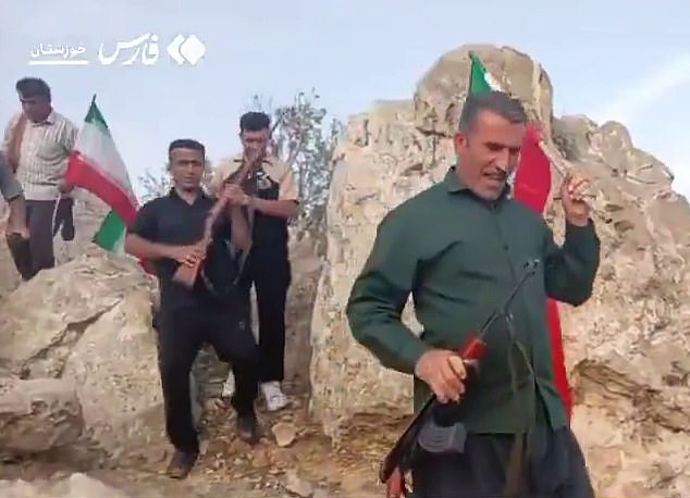 Following the crash, Iranian military forces put a $60,000 bounty on the airman's head, prompting Iranian militants to hunt for him in the mountains. (Pictured: Bakhtiari tribes in Khuzestan headed into the mountains, rifles in hand, searching for the missing American F-15 jet pilot)