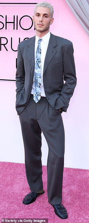 Kendall Jenner's socialite pal Fai Khadra went for the traditional look of a suit and tie