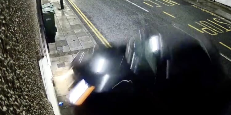 Moment car spins out of control & smashes into house before driver blames imaginary 'buddy' who ran away