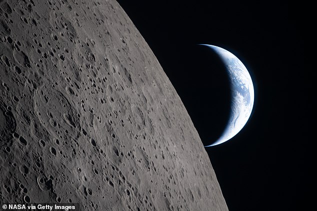 From this unique perspective, the daytime side of the Earth appears as a thin crescent silhouetted against the blackness of space. What these pictures don't show is that only 20 per cent of the moon was illuminated at this time
