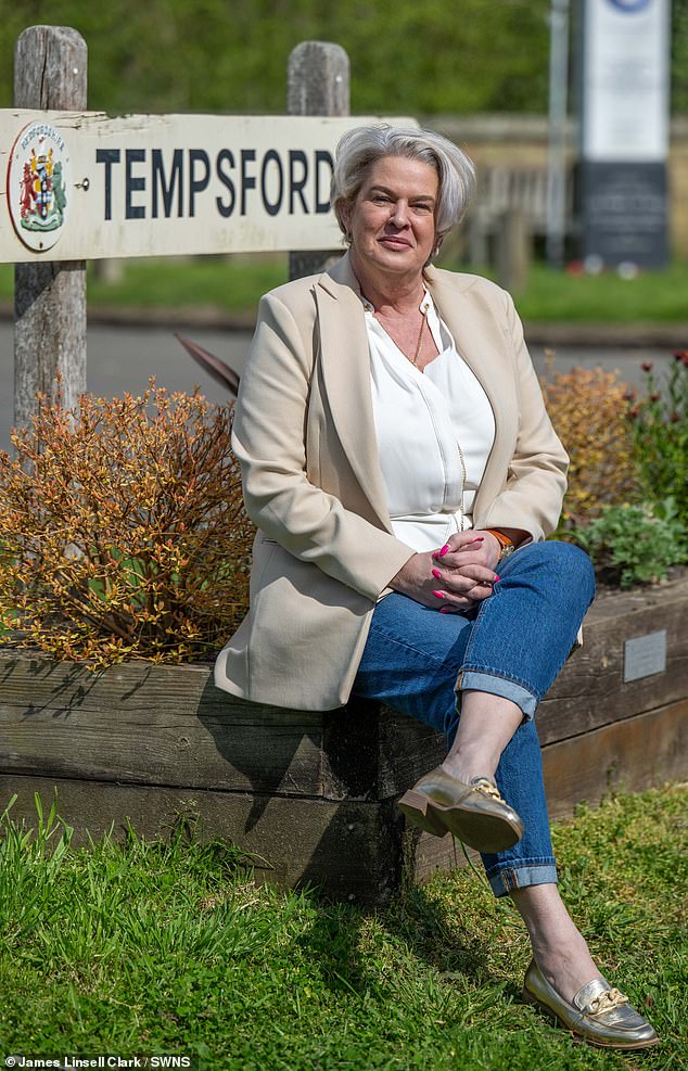 Julie Stanley (pictured), 53, said her home was plagued by floodwaters - which left her having to be rescued by the fire brigade