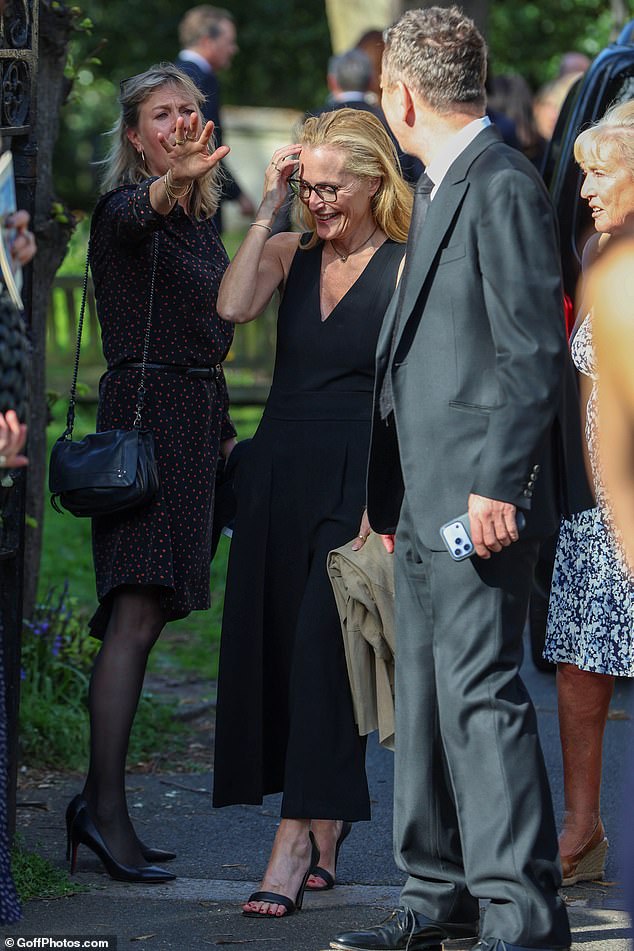 Gillian seen talking to guests at the church