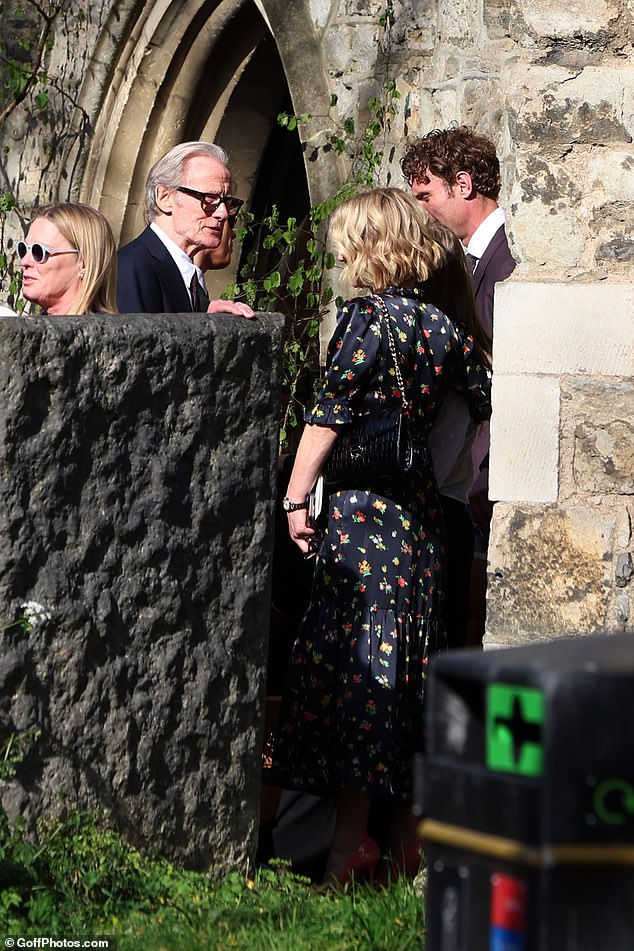 Bill seen speaking with guests