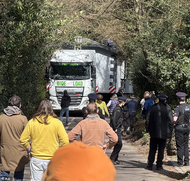 Some furious residents tried to stop the operation on Sunday, leading to one arrest