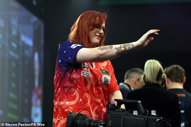 The 29-year-old made history as the first trans athlete to compete at the World Championship of Darts (pictured in 2024)