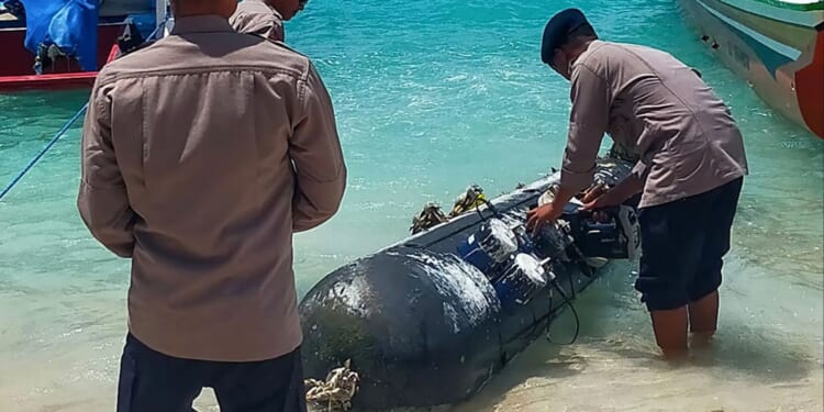 Fisherman catch 12ft secret underwater Chinese spy drone in choke point waters off tourist island