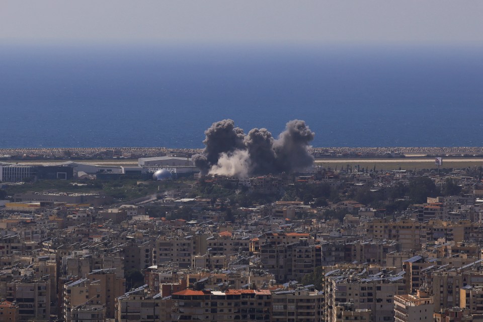 Smoke rises following an Israeli strike on the southern suburbs of Beirut