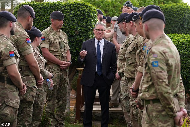 Keir Starmer meets aircrew members stationed at King Fahd Airbase in Taif, Saudi Arabia, on the first leg of his Gulf tour
