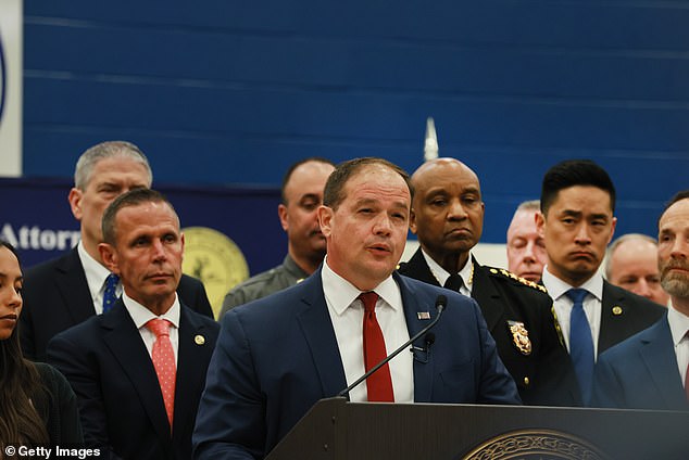 Suffolk County District Attorney Ray Tierney told each family of the victims: 'Thank you and we¿re sorry'