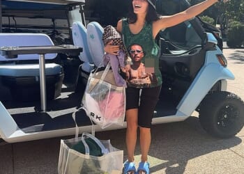 Kylie Jenner has arrived in the desert of Indio, California on day 1 of the highly-anticipated festival wearing a profane top featuring pal Justin Bieber sticking up his middle finger