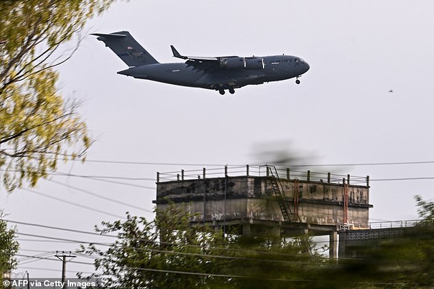 A US Air Force Boeing C-17A Globemaster III aircraft prepares to land at Pakistan's Nur Khan military airbase in Rawalpindi