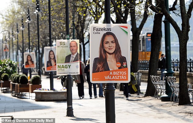 Signage can be seen for political parties in Budapest city centre ahead of the Hungarian elections