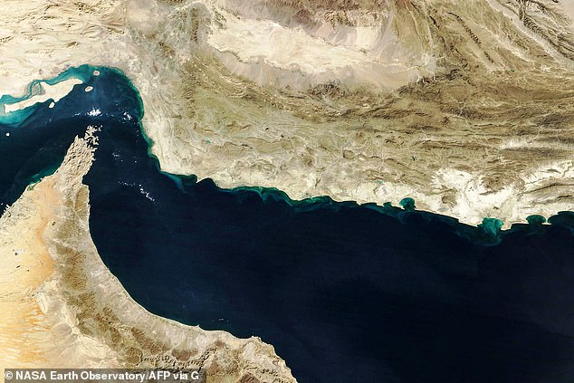 This handout natural-colour image acquired with MODIS on NASA's Terra satellite taken on February 5, 2025 shows the Gulf of Oman and the Makran region (C) in southern Iran and southwestern Pakistan, and the Strait of Hormuz (L) and the northern coast of Oman (bottom)