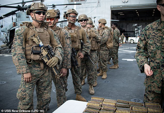 U.S. Marines, with the Battalion Landing Team 3rd Battalion, 1st Marines (3/1), 31st Marine Expeditionary Unit (MEU), conduct a live fire evolution on the flight deck of San Antonio-class amphibious transport dock ship USS New Orleans (LPD 18), while underway, February 11th, 2026