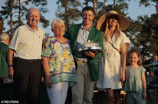 L-R: His father Gerry McIlroy, mother Rosie McDonald, McIlroy, wife Stoll and daughter Poppy