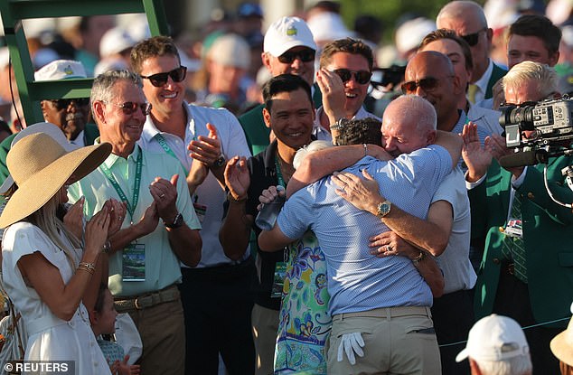 There was also a warm hug with his father and mother after another thrilling win at Augusta