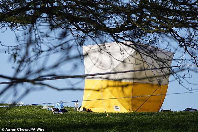 A yellow forensic tent at the scene in Primrose Hill