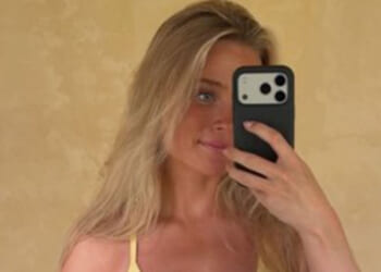 Man Utd's sexiest fan stuns in busty gym outfit ahead of crunch Leeds game