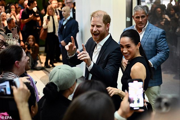 Harry and Meghan greet crowds during their visit to the Royal Children's Hospital in Melbourne