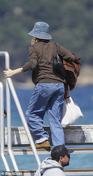 The Hollywood star tried to keep low-key wearing a blue denim bucket hat