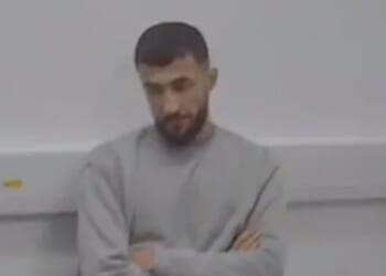 Small boat migrant kept videos of him taking part in a gang rape on Brighton beach as 'trophies', court hears